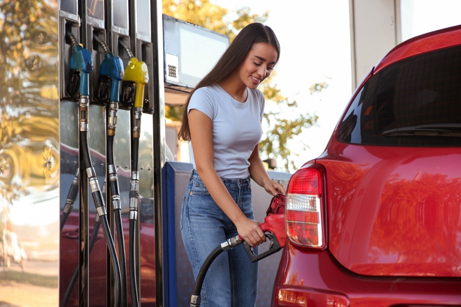 stock-photo-young-woman-refueling-car-at-self-service-gas-station-1844880265-transformed